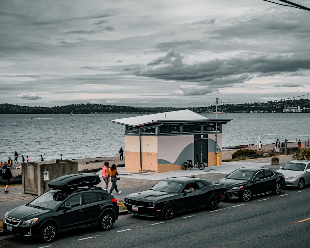 a group of cars parked on the side of a road