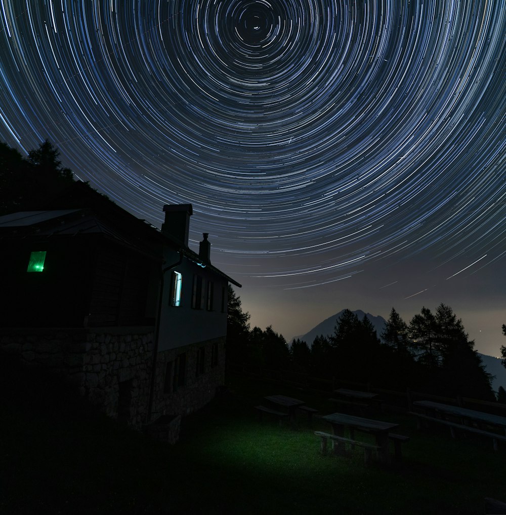 a star trail is seen in the night sky