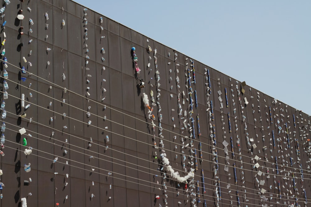 a building with a bunch of clothes hanging on the side of it