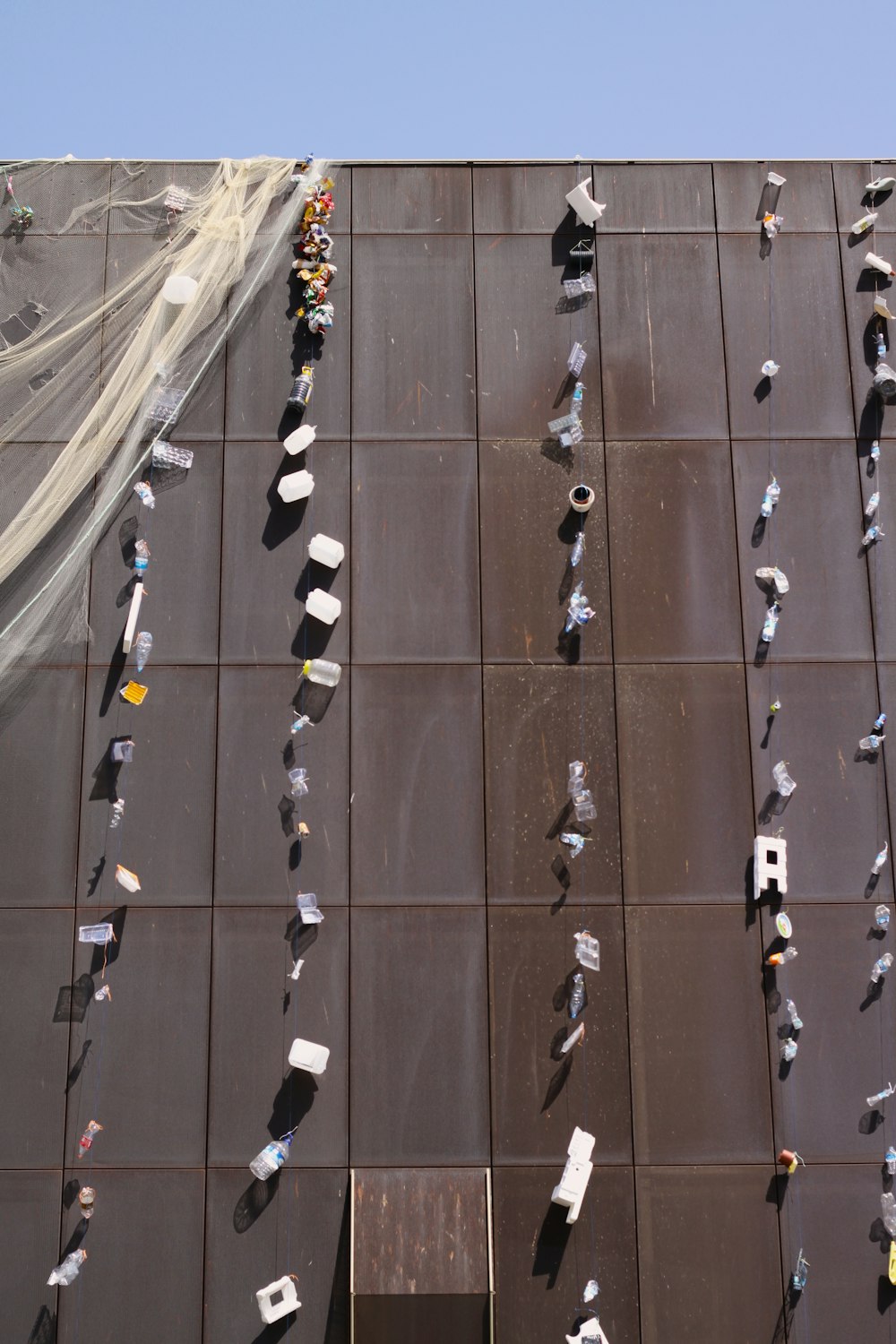 a group of people standing on top of a building