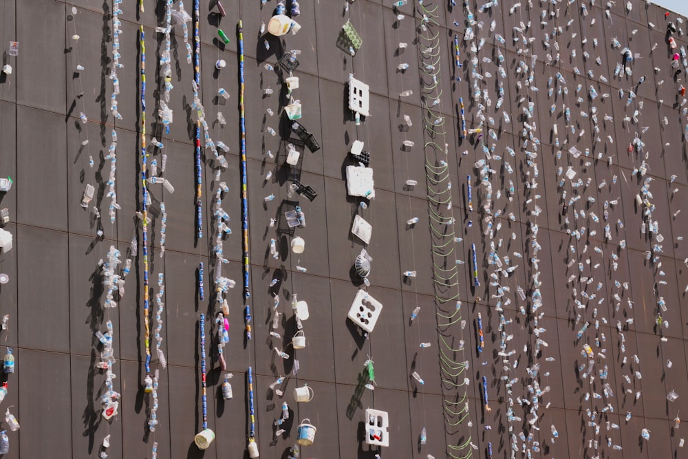 a large building with a bunch of objects hanging on the side of it