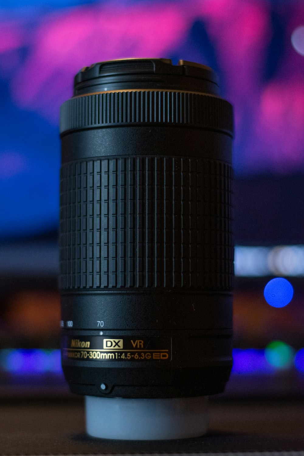 a camera lens sitting on top of a table