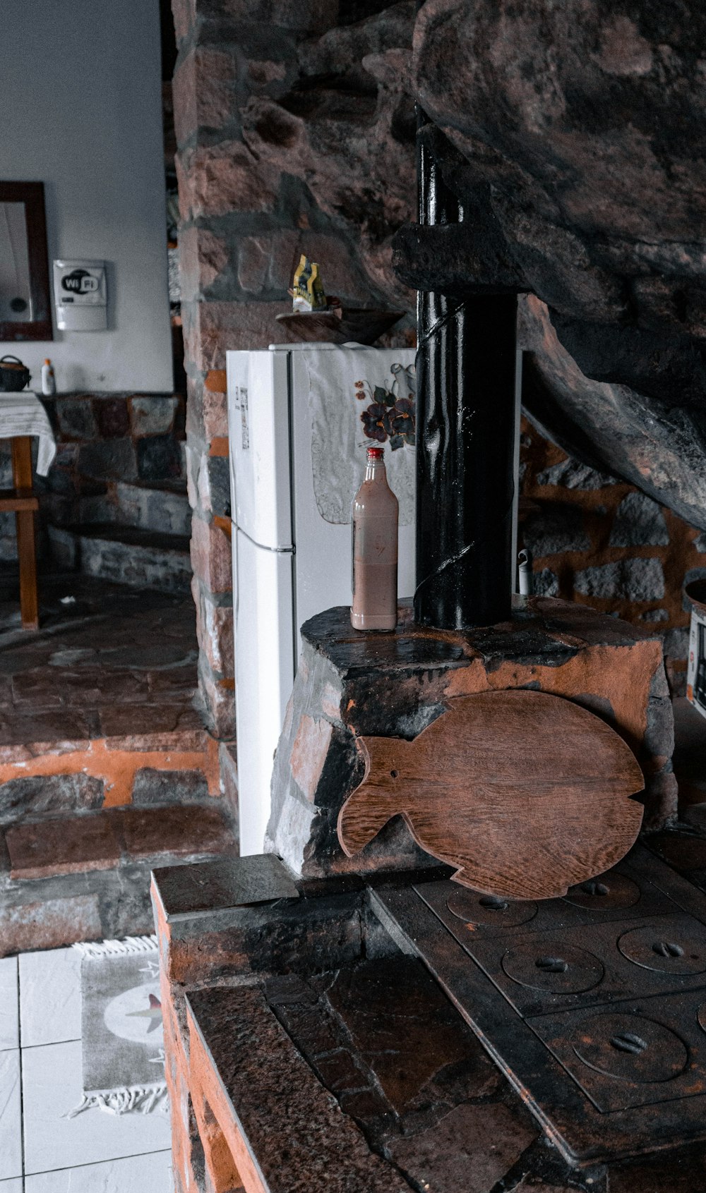 a stove top oven sitting inside of a kitchen