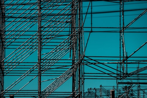 A completed steel structure with clear blue sky background.