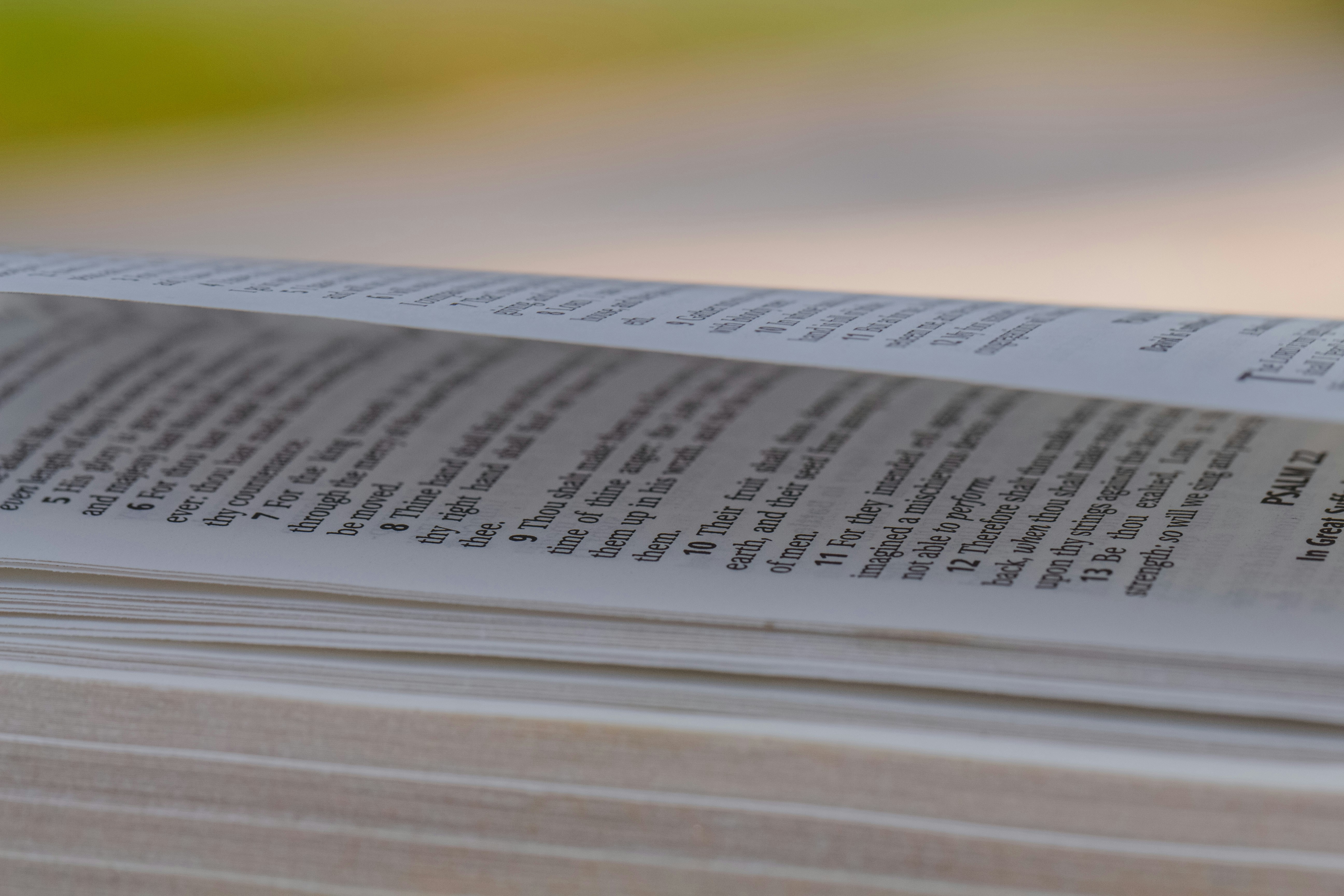 a close up of a book with a blurry background