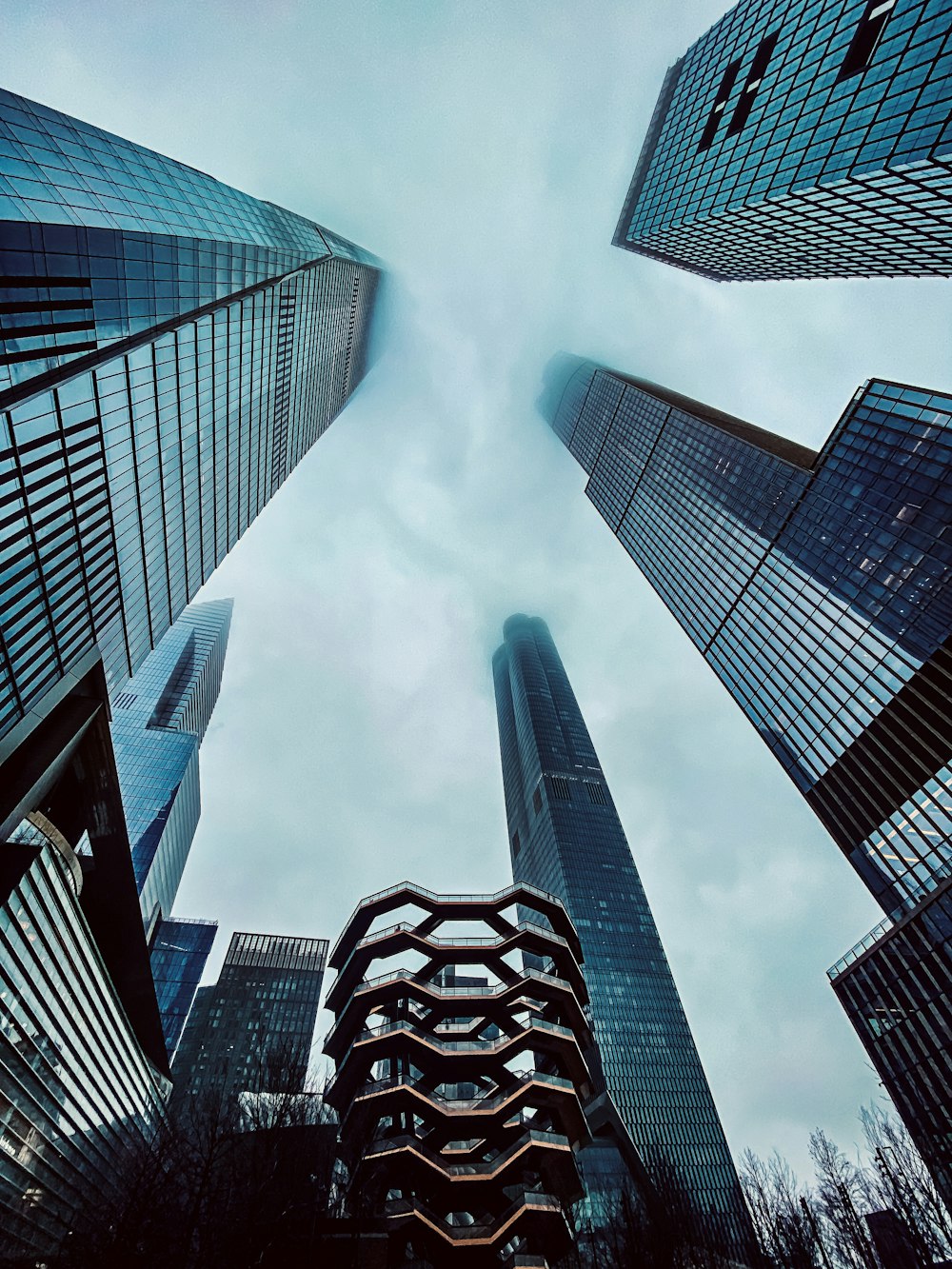 a group of tall buildings towering over a city