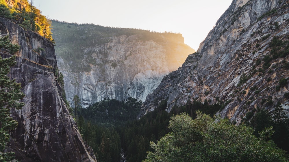 a view of a canyon with a mountain in the background