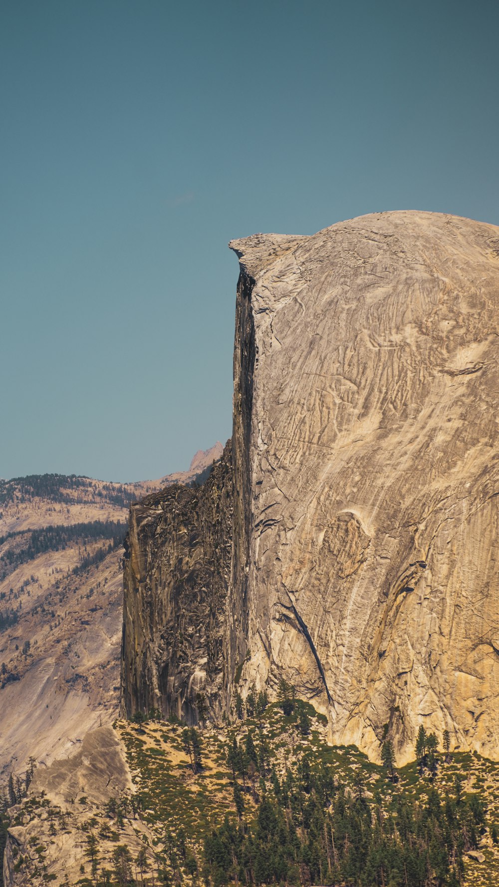 a mountain with a very tall rock face