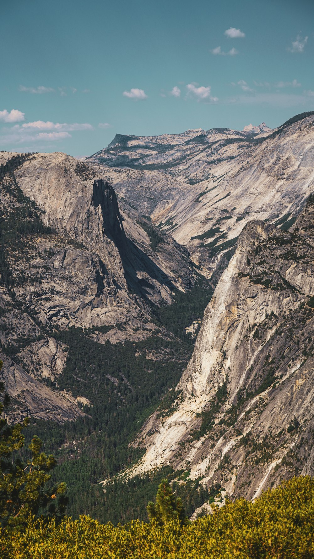 a view of the mountains from the top of a mountain