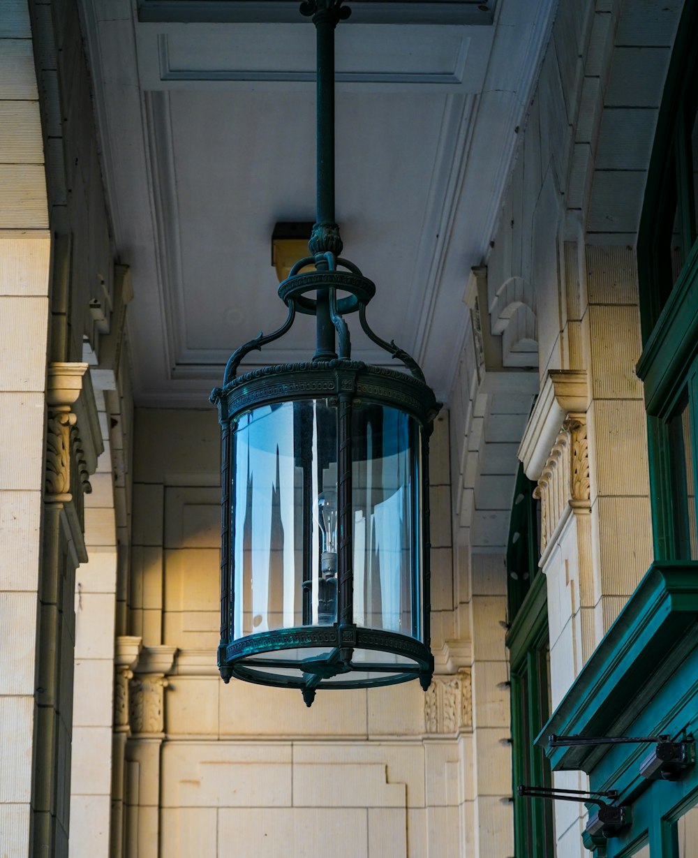 a light hanging from the side of a building