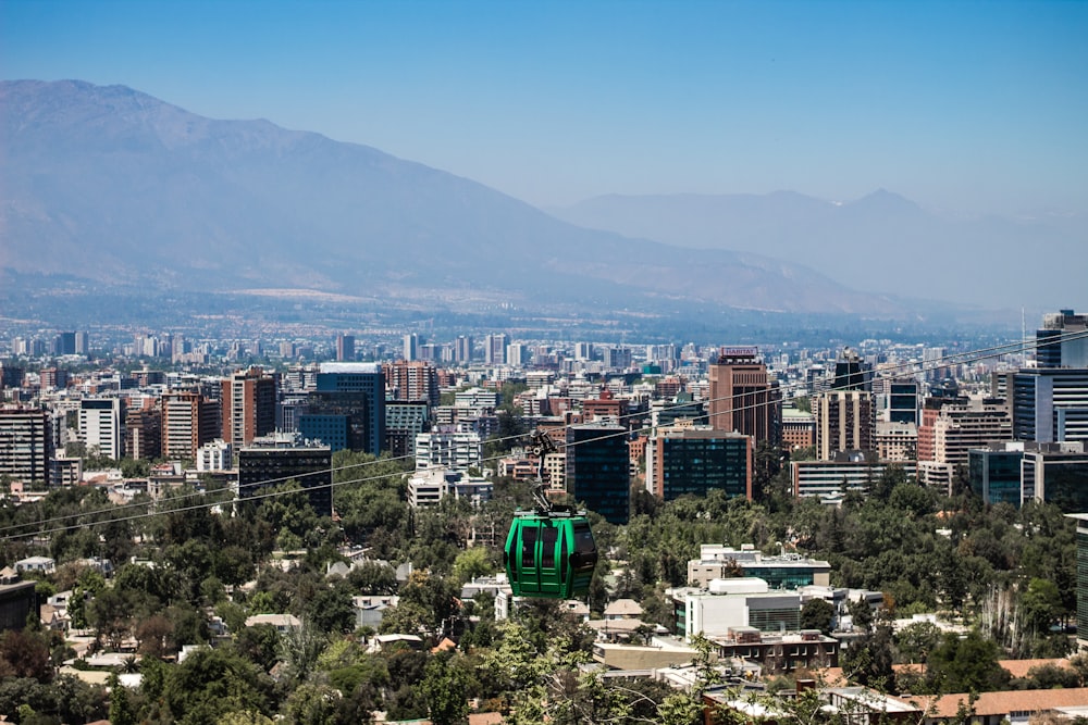 a view of a city with mountains in the background