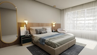 a bedroom with a large bed and a large mirror
