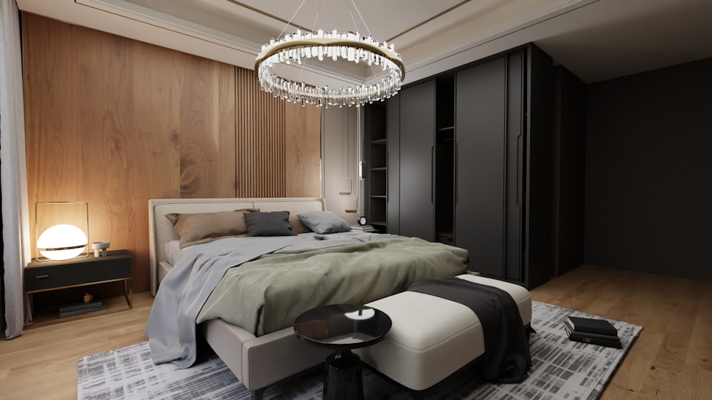 a bedroom with a large bed and a chandelier