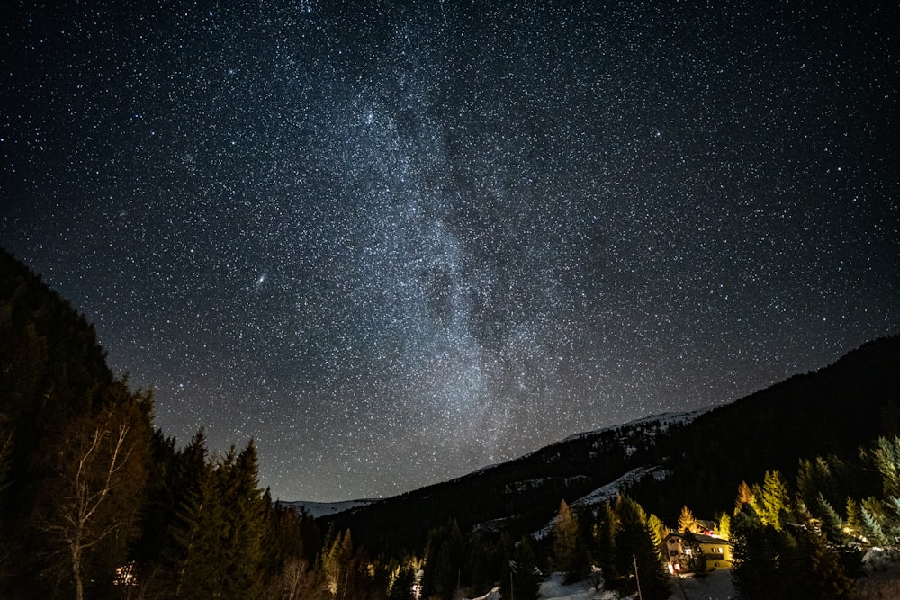 a view of the night sky with the milky in the background