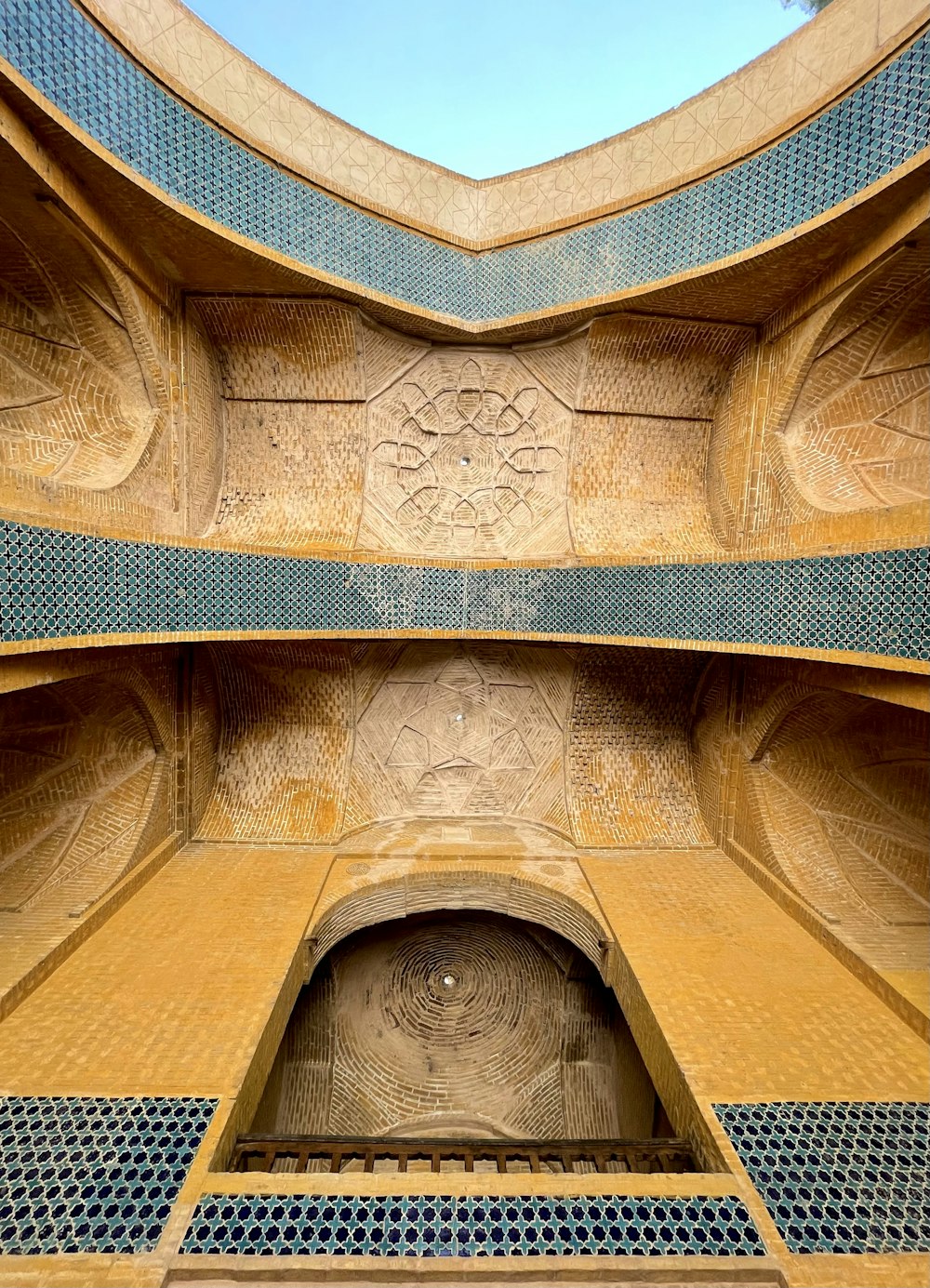 the inside of a building with a circular window