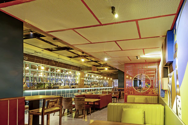 Before and after shots of a restaurant interior showing complete renovation and modern design.