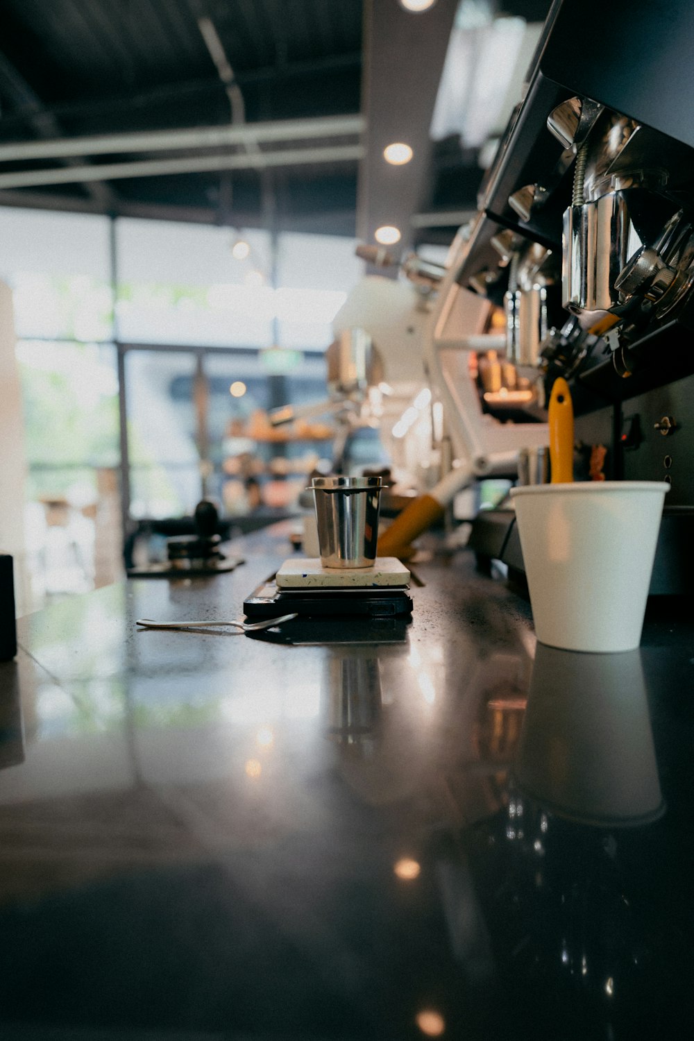 a coffee cup sitting on top of a counter