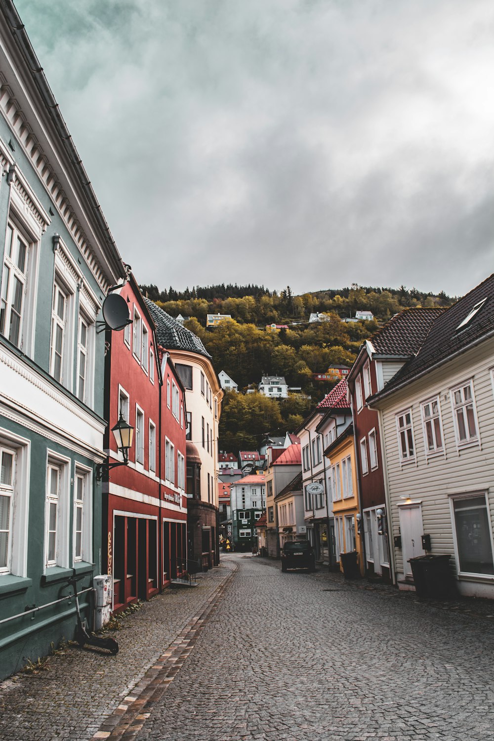 a cobblestone street in a small town