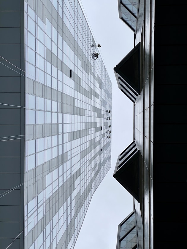 a couple of tall buildings next to each other