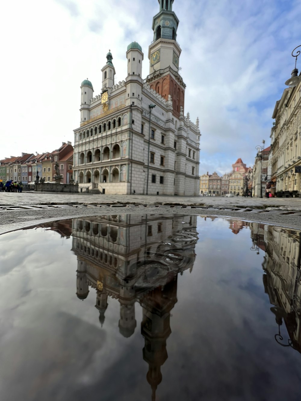 a reflection of a building in the water