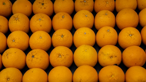 Finished product displayed on a grid-patterned table with an orange accent light.