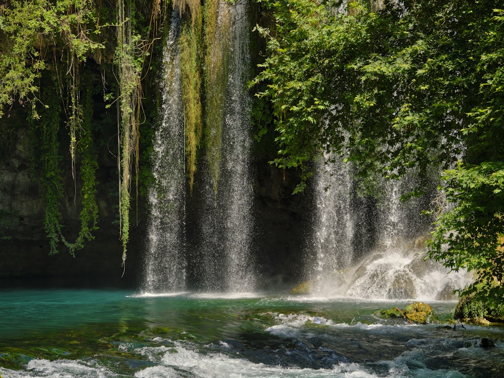 a waterfall with water running down the side of it