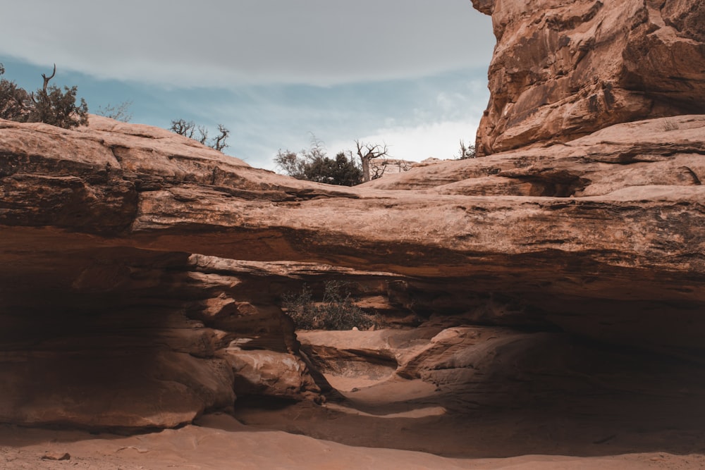 a rock formation in the middle of a desert