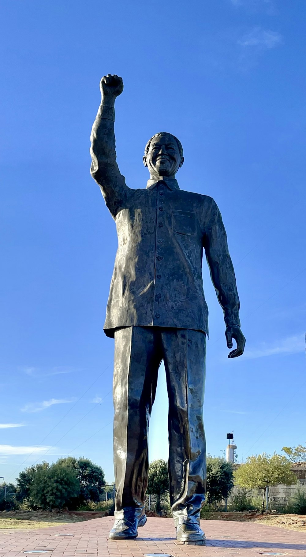 a statue of a man with his fist up