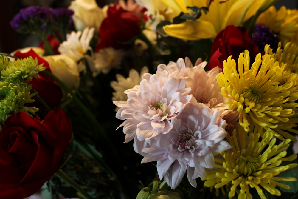 a bunch of flowers that are in a vase