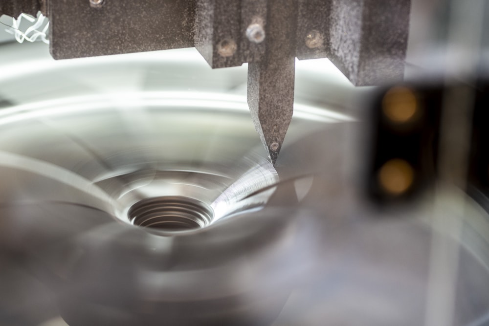 a close up of a metal object with a blurry background