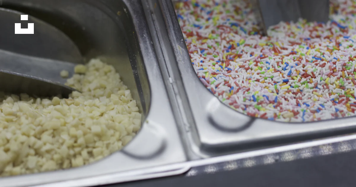 A couple of trays filled with rice and sprinkles photo – Free Grey ...