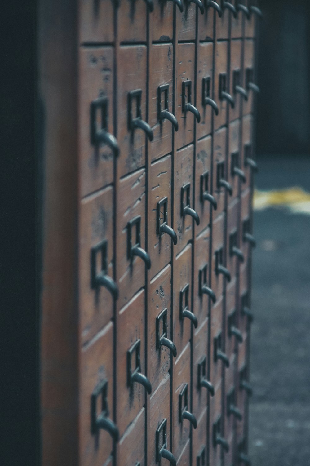 a close up of a metal door on a building