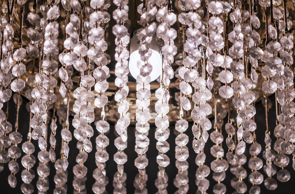 a chandelier hanging from a ceiling in a room