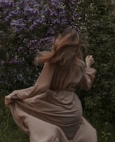 A vibrant floral dress flowing gently on a breeze outdoors.