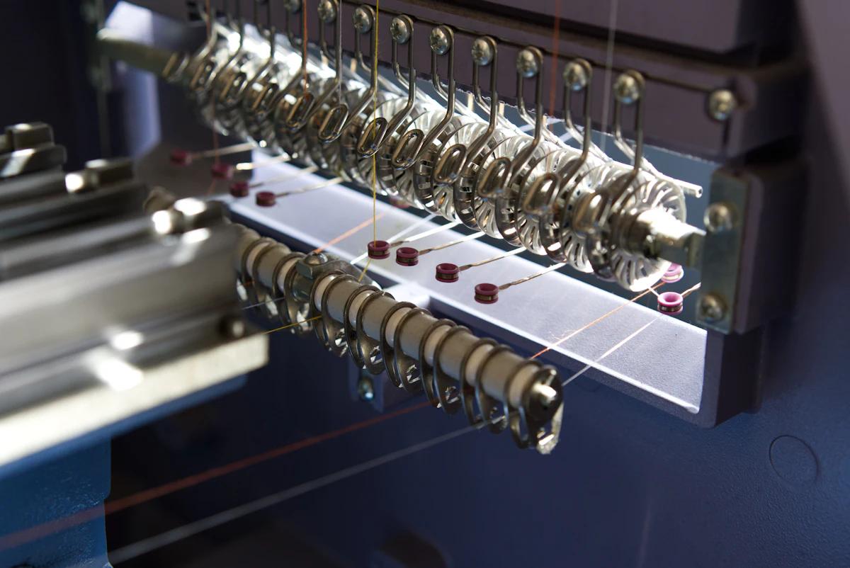 Close-up of a textile machine at work