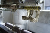a close up of a machine working on a piece of fabric
