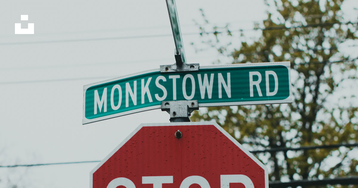 Stop Sign Under Sign A red stop sign sitting under a street sign photo – Free Brown Image on ...
