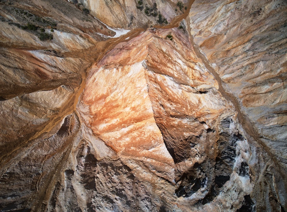 an aerial view of a rock formation in the desert