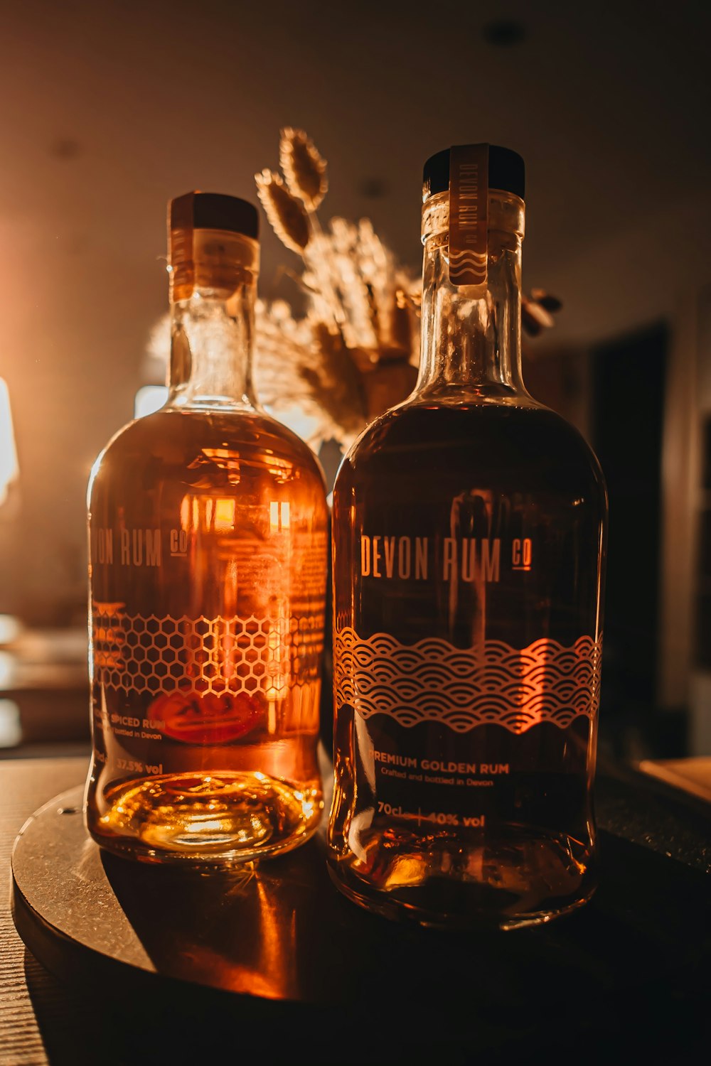 a couple of bottles of liquor sitting on top of a table