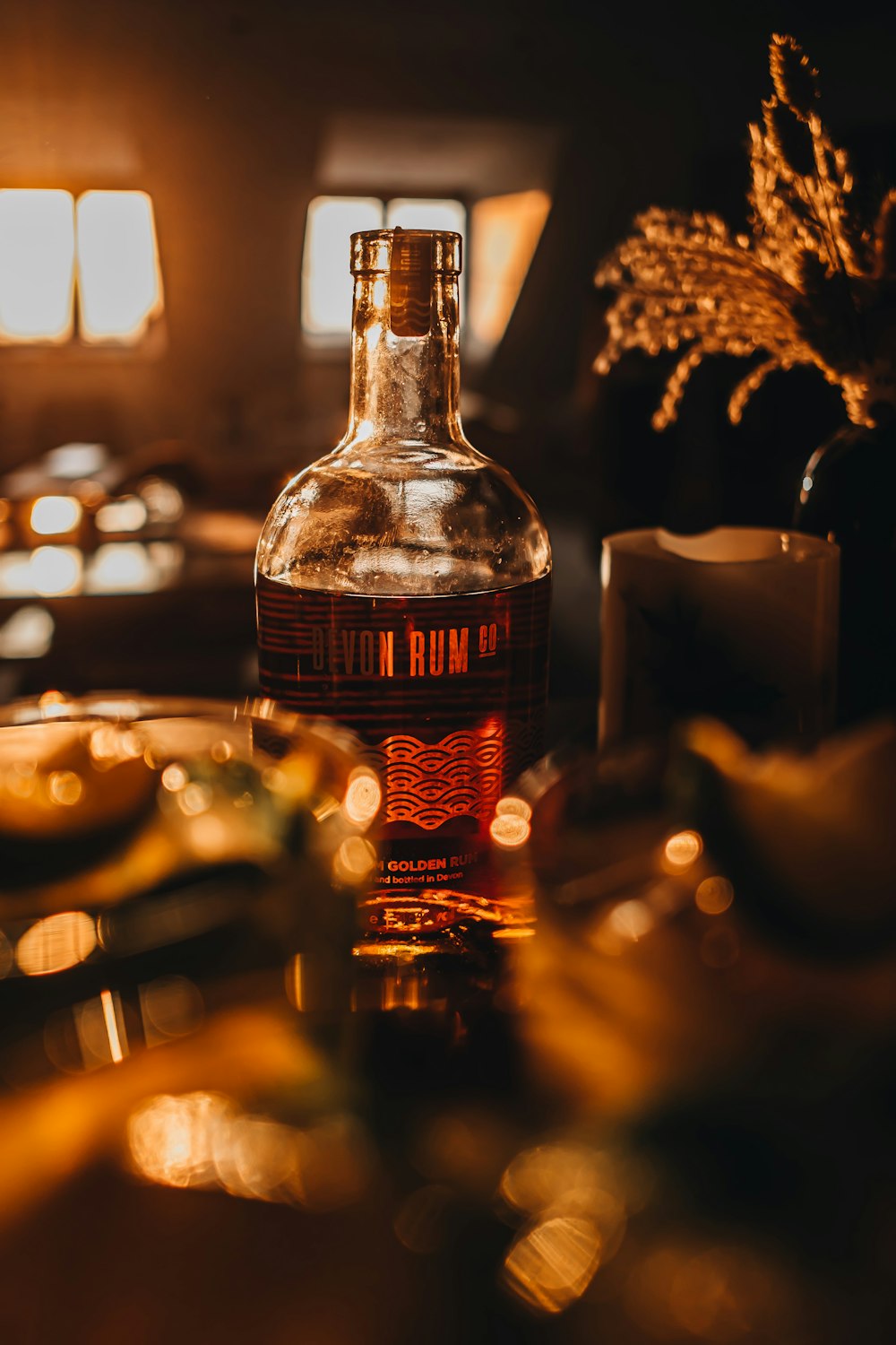 a bottle of rum sitting on top of a table