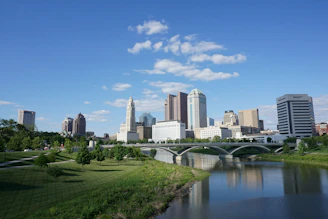 a view of a city with a bridge over a river