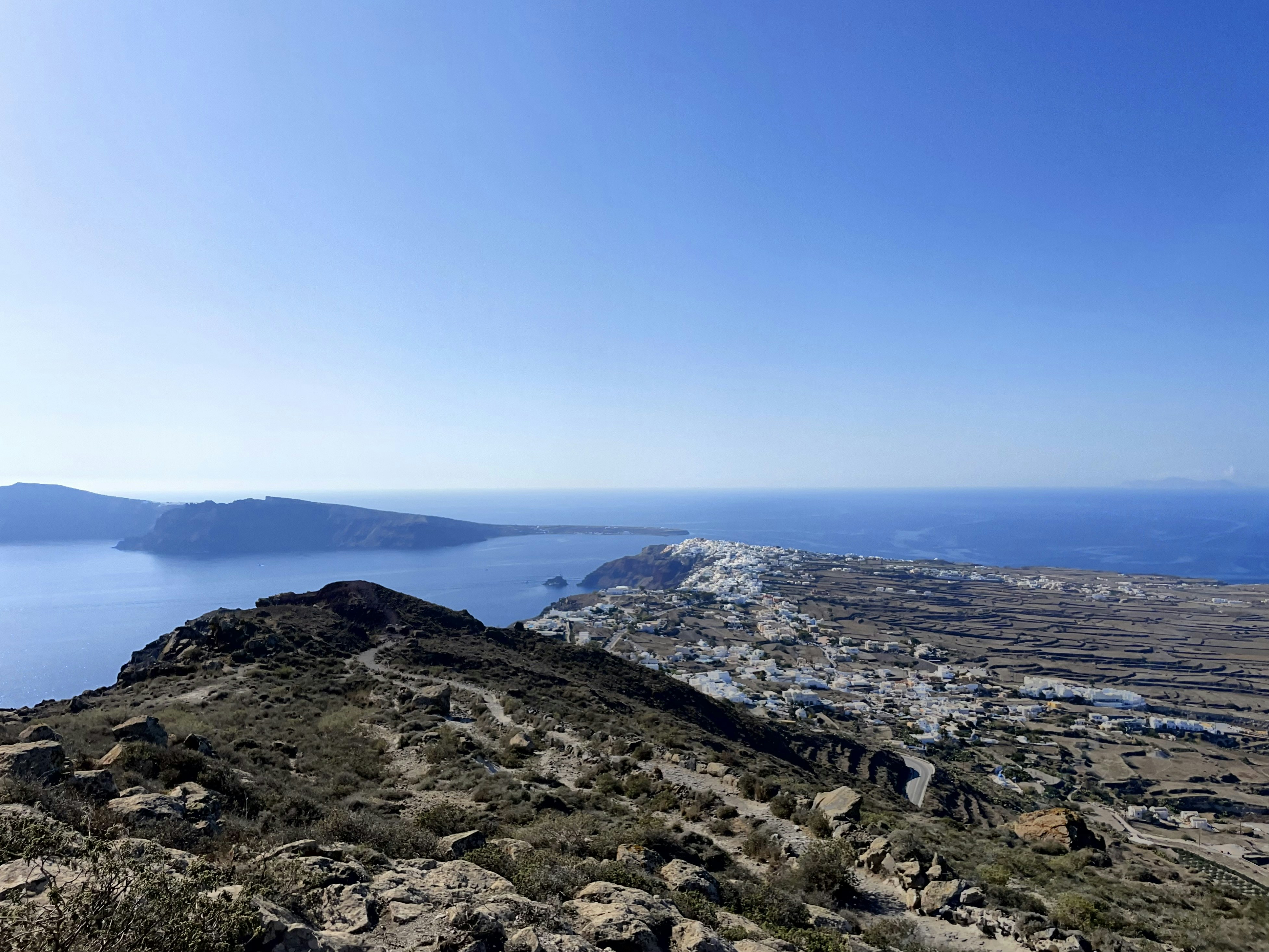 a view of the ocean from the top of a mountain