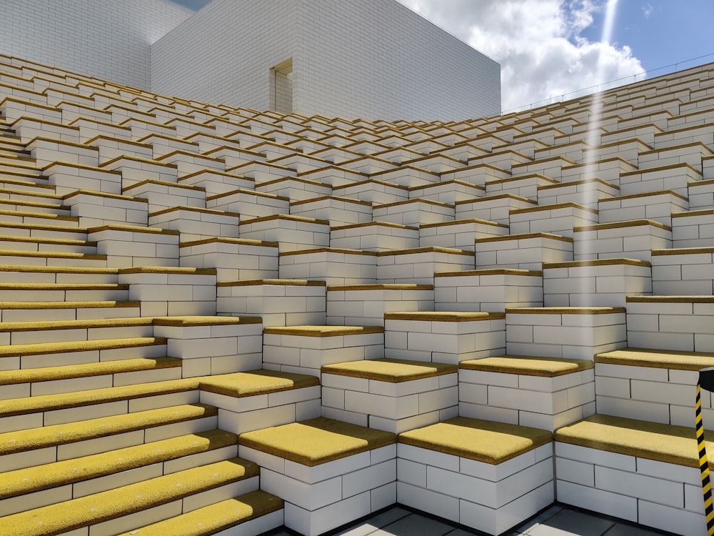 a bunch of yellow and white steps in front of a building