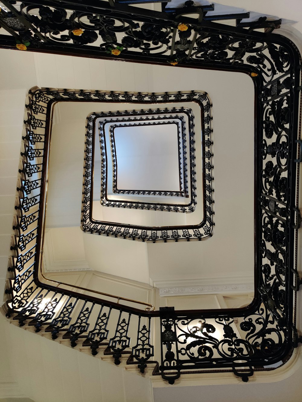 a mirror that is on the side of a wall