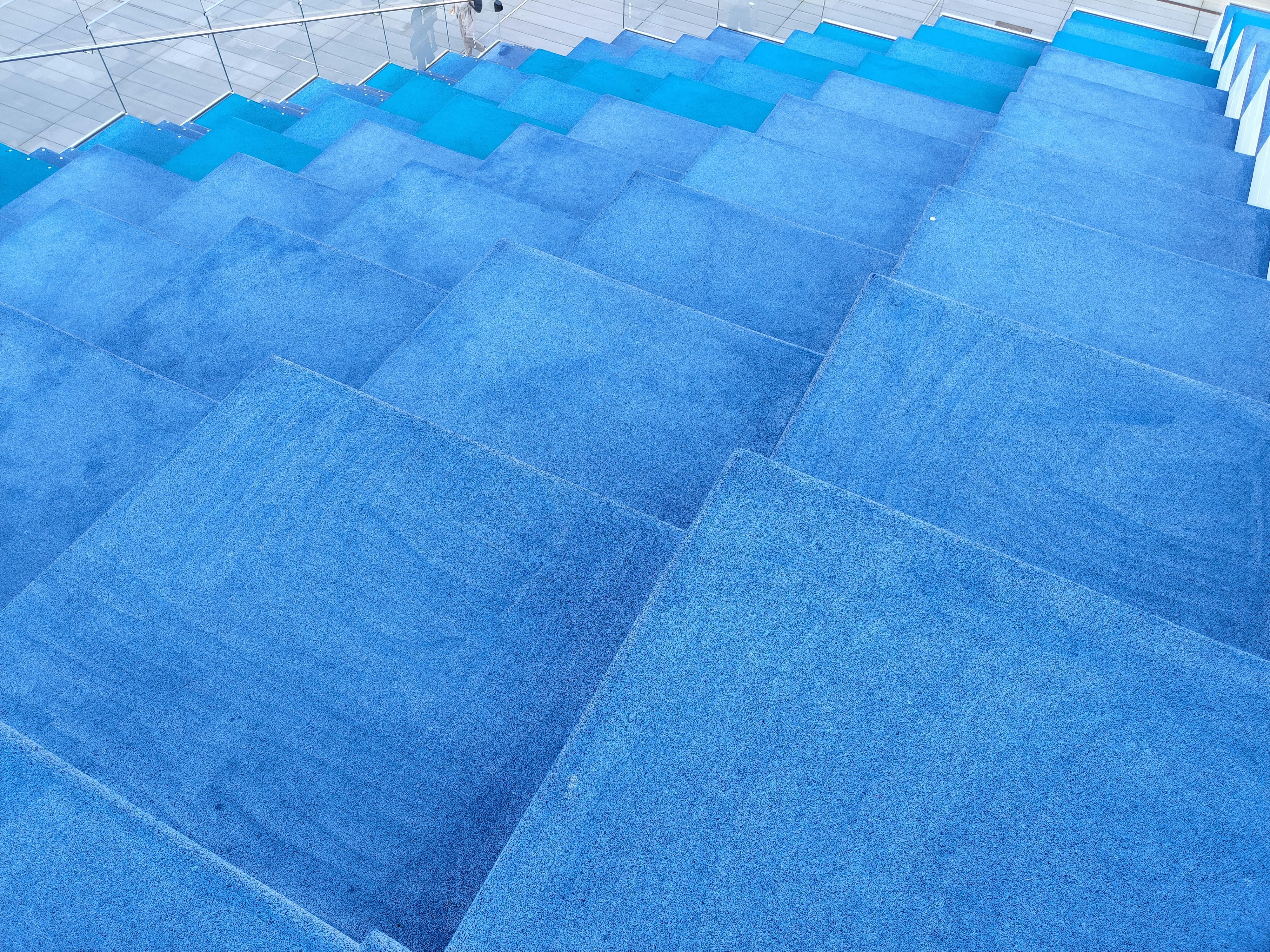 a person riding a skateboard down a set of stairs