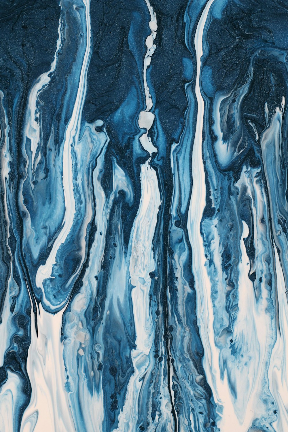 an abstract painting of blue and white colors