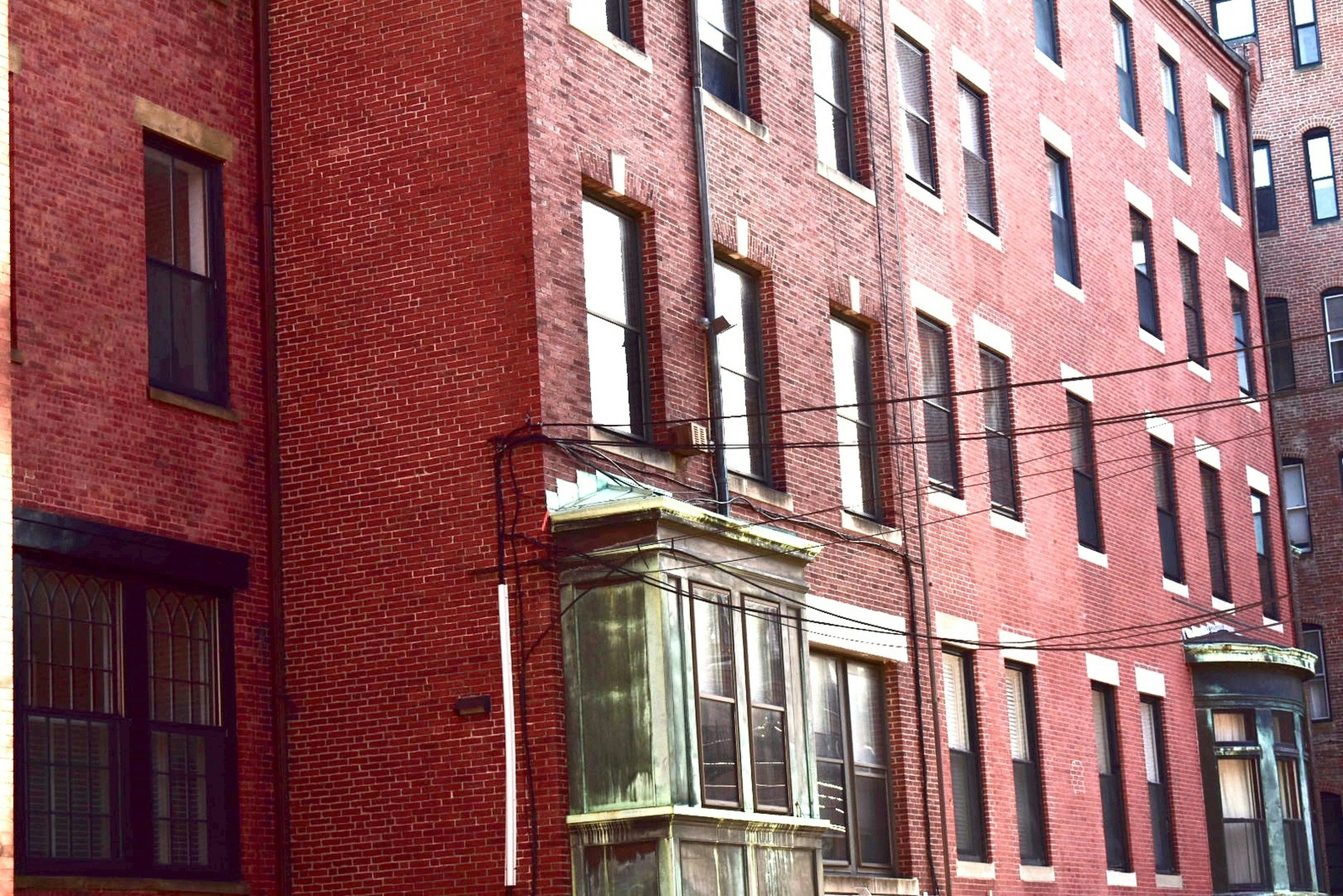 Exterior of a historic brick loft building in Detroit - Pet friendly lofts Detroit