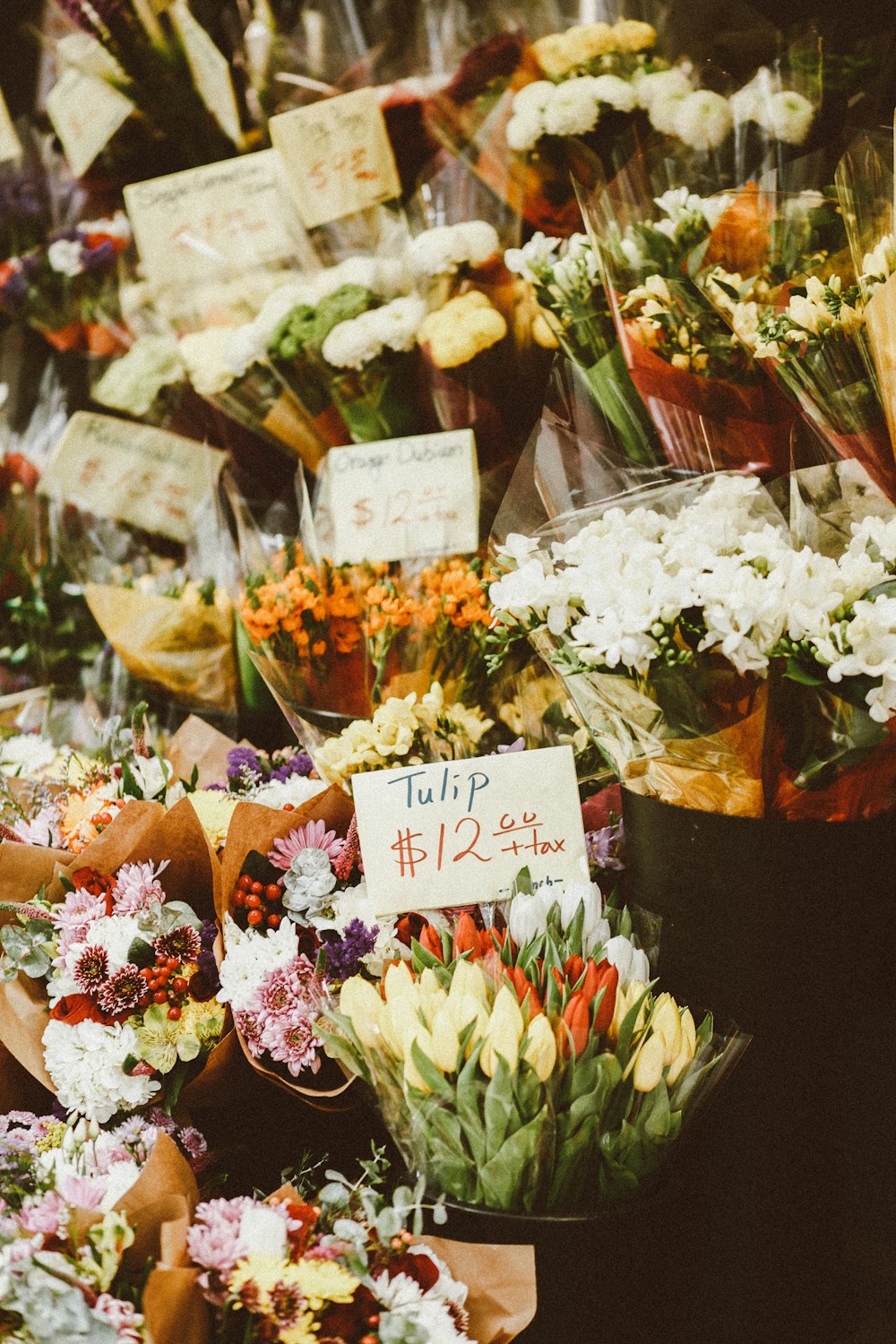 a bunch of flowers that are on a table