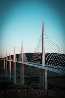 a very tall bridge spanning over a large body of water