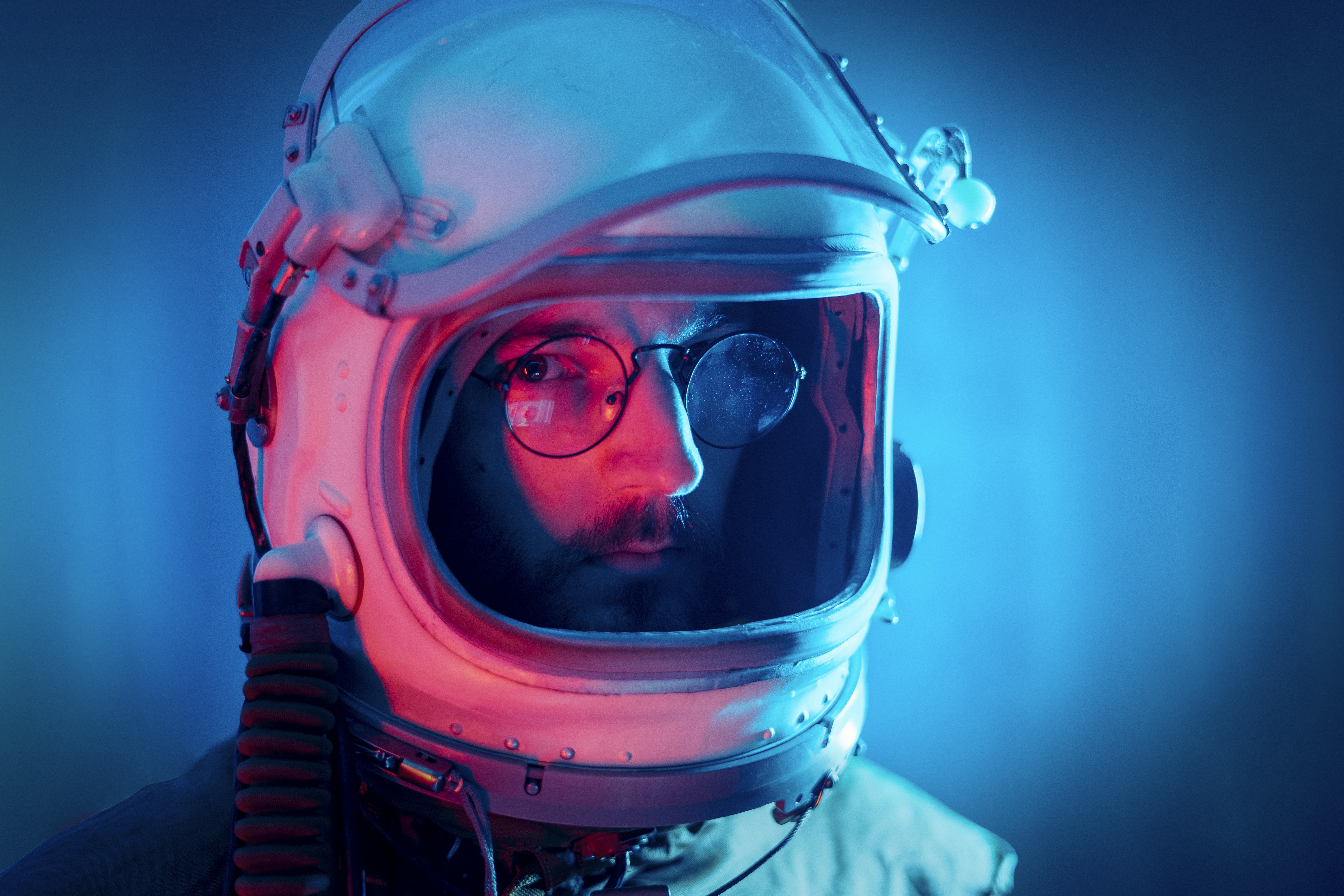a man wearing a space suit and goggles